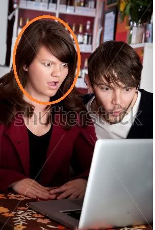 stock-photo-woman-and-man-staring-with-shock-at-laptop-computer-56680339.jpg